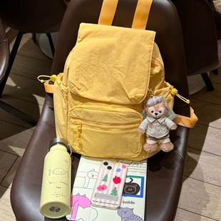 童趣户外运动奶黄双肩包学生通勤简约书包休闲百搭轻便旅行包背包