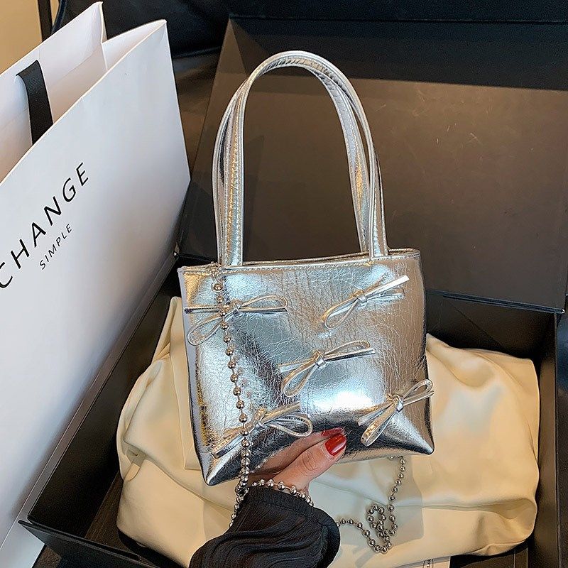 今年流行小2025简约百搭链条单肩斜挎包质感手提水桶包通用款女包,箱包皮具/热销女包/男包,通用款女包,淘宝优惠券,粉丝福利购,淘宝优惠卷