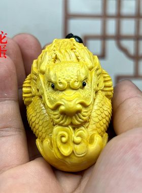 黄杨木雕招财龙吐息挂件