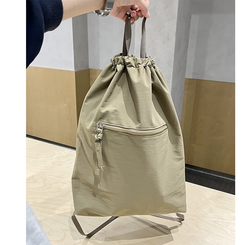 轻便大容量运动健身斜挎双肩包日系户外旅行背包多功能柔软水桶包