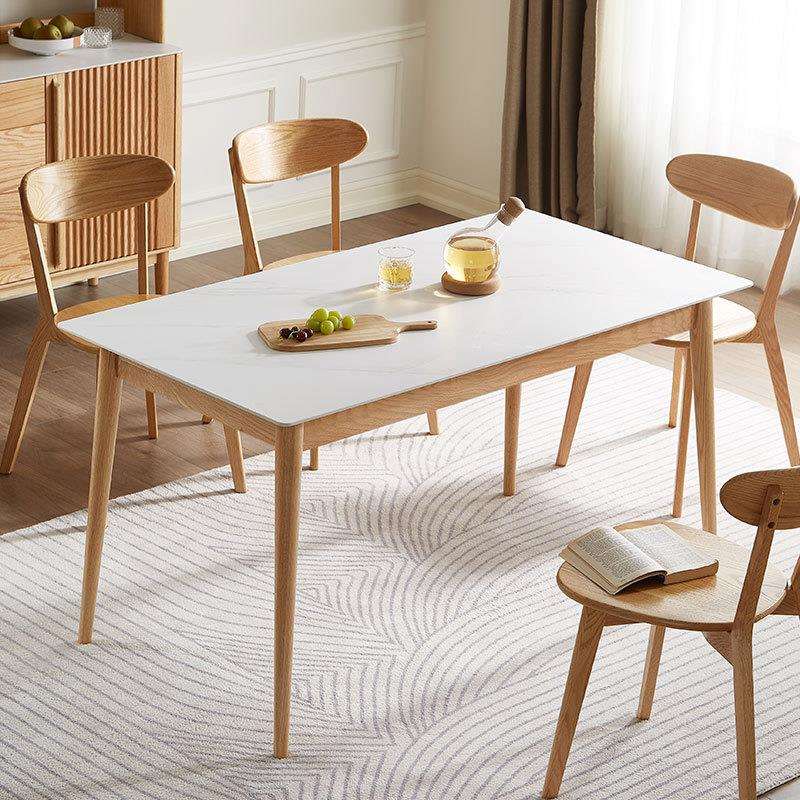 北欧实木原木色亮光岩板餐桌椅组合家用高级现代简约桌子小户型