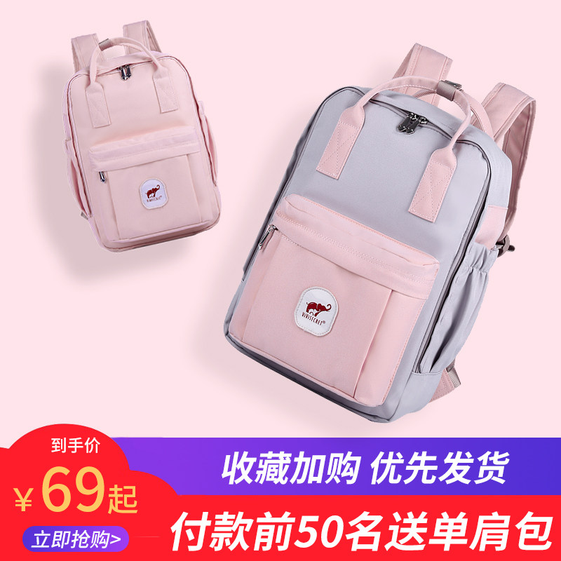 韩版甜甜圈双肩包女中小学生书包校园时尚百搭帆布旅行电脑背包男