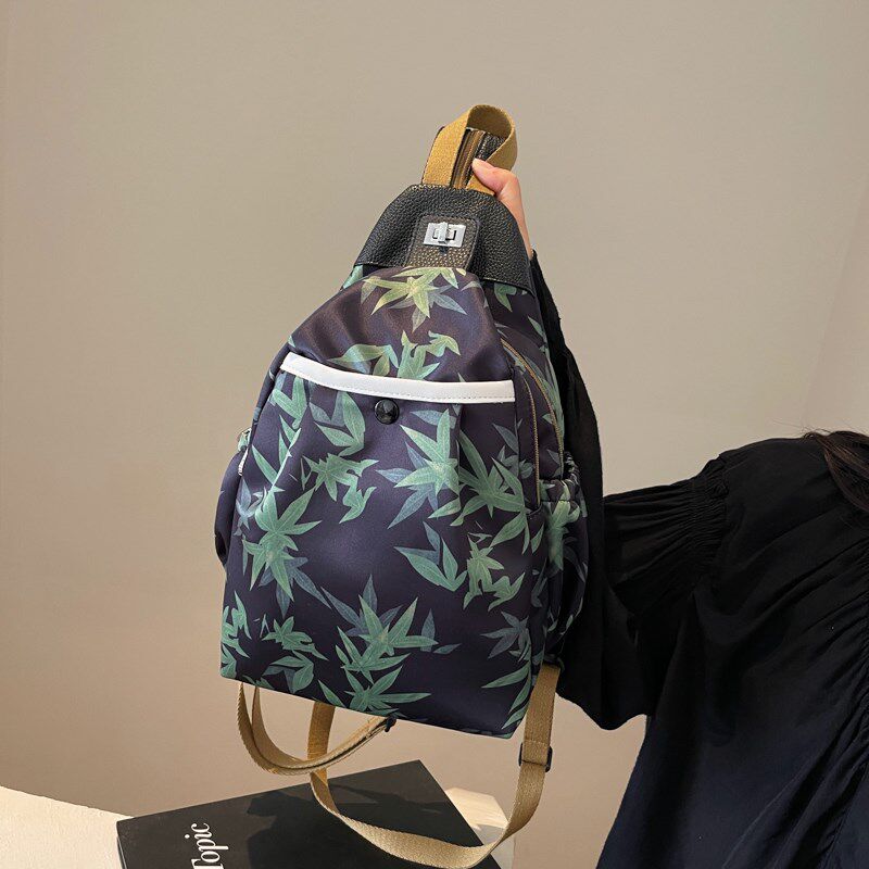 小型两用双肩包女外出小书包旅游小型女士斜挎包印花旅行轻便背包