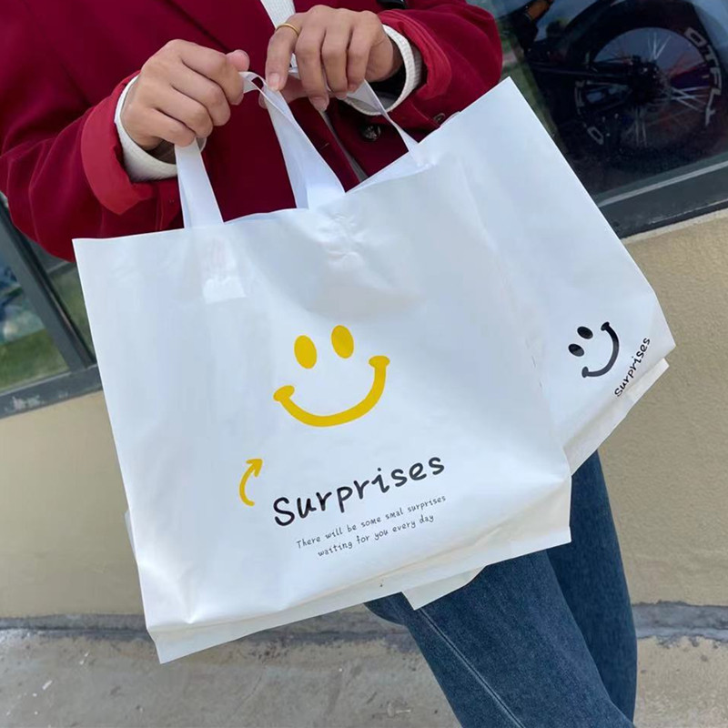 惊喜网红b新笑脸卡通可爱ins风塑料服装店手提袋盒子收纳化妆礼品