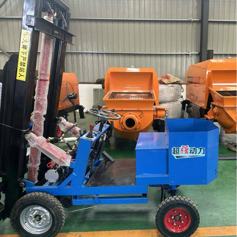 厂家直销小型简易四轮电动叉车座驾式微型起重升降堆高车