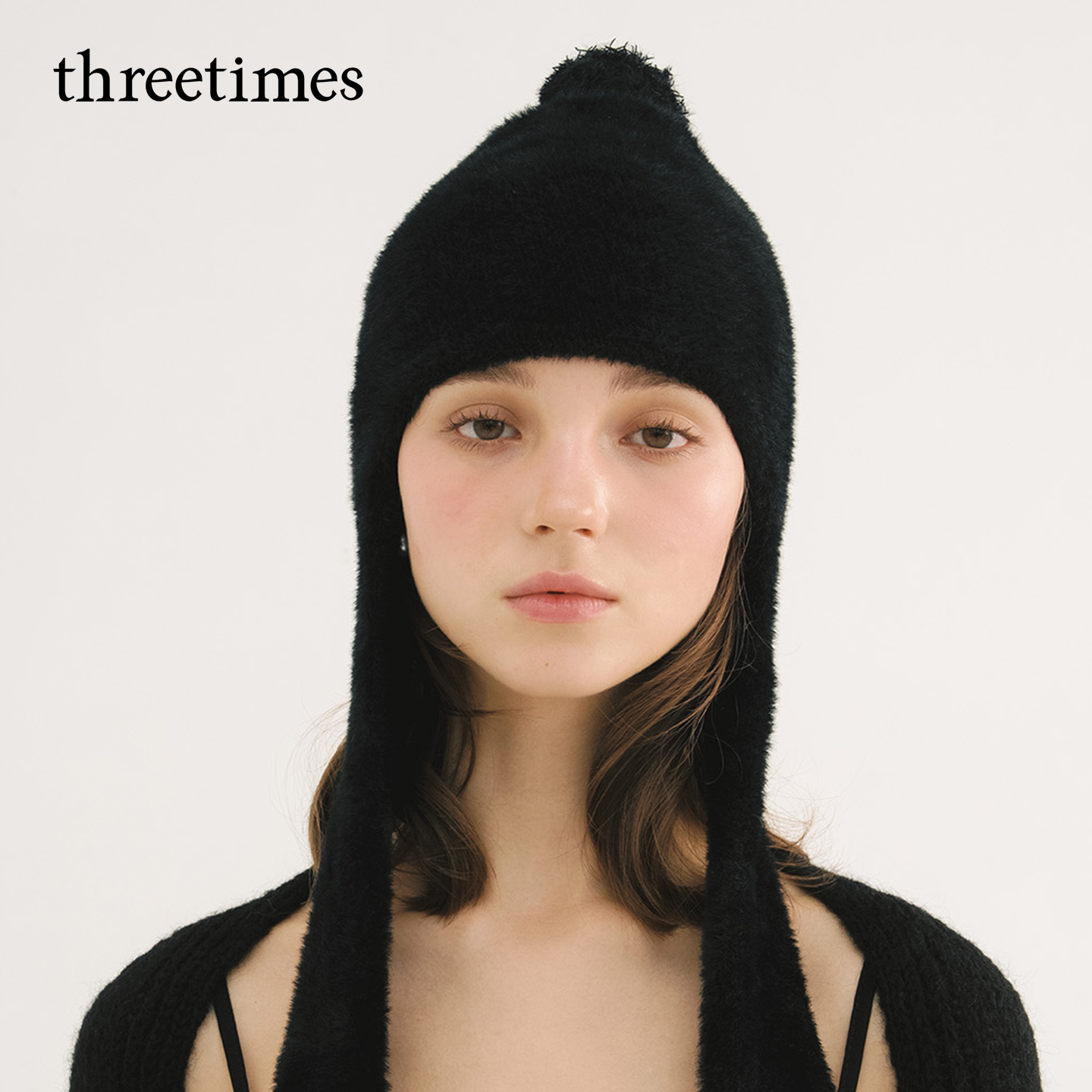threetimes2025新款冬季长辫保暖护耳帽女显脸小洋气防寒毛绒帽子