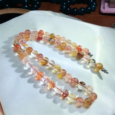 X33天然红黄胶花水晶项链凤羽9mm多宝色