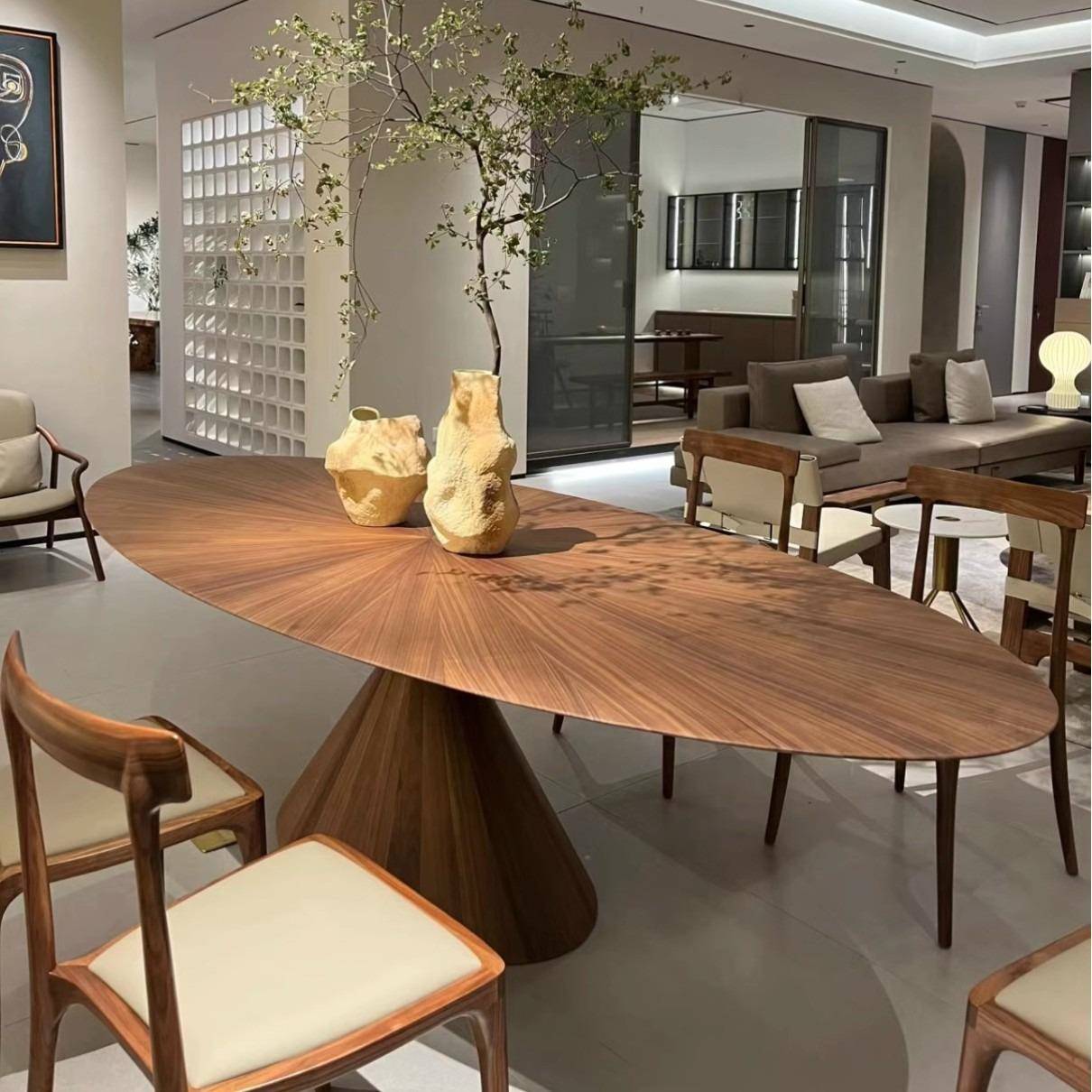 网红飞碟餐桌黑胡桃木椭圆ufo设计师别墅大平层北欧极简办公桌子