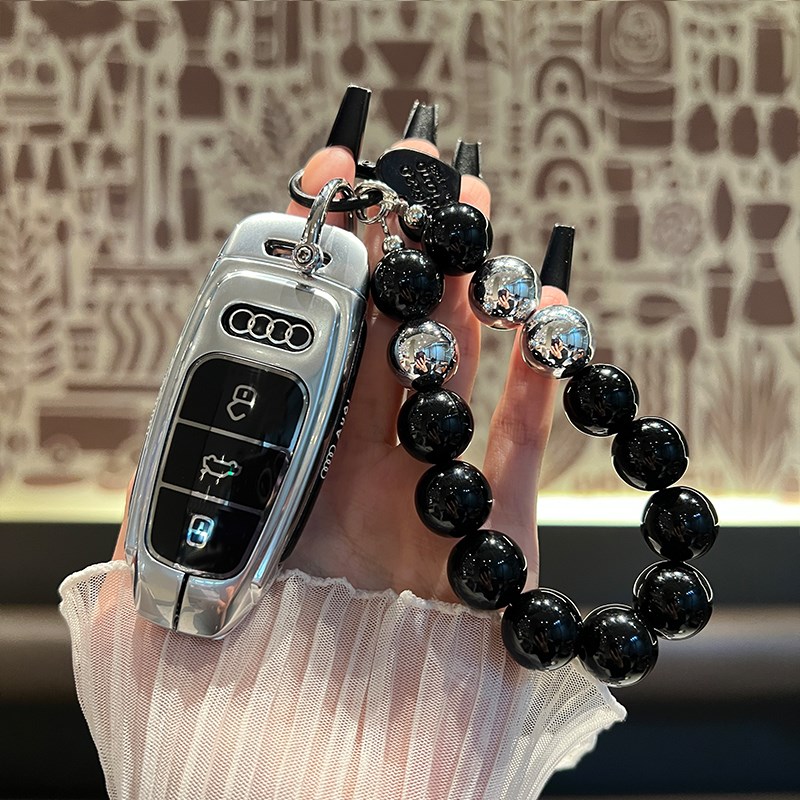 适用奥迪钥匙套新款A6L/Q7/Q8/A3L/A8L/A7/Q4钥匙包壳扣高档男女