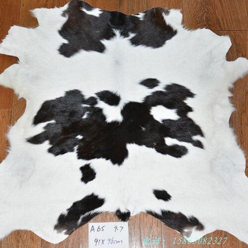 真皮毛一体整张奶牛皮地毯 奶牛羔皮A65胎牛皮台布 桌布地垫 门垫