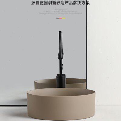 北欧卫生间台上盆纯圆形洗手家用小尺寸阳台家用陶瓷色洗脸面漱盆