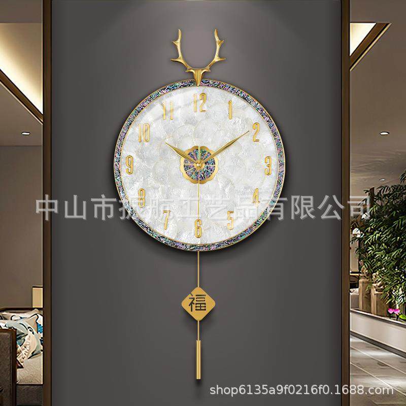 2024新款家用钟表客厅挂钟简约现代网红创意轻奢贝壳挂表挂墙