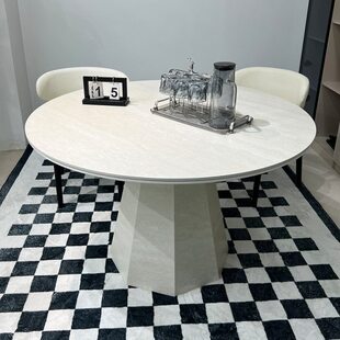 年岩板餐桌简约现代诧寂吃饭桌风2024古石洞高端圆形中小户型新款