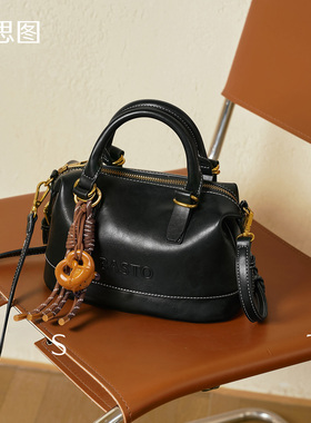 百思图女包2026新款黑色斜挎包女波士顿枕头包真皮手提保龄球包包