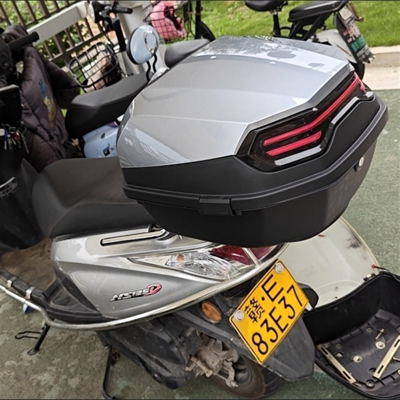 适用新大洲本田NS125D后备箱SDH125T-35/38弯梁摩托车尾箱储物箱