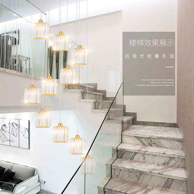 复式楼梯吊灯中空楼别墅现代客厅跃层楼中楼旋转楼梯简约水晶吊灯