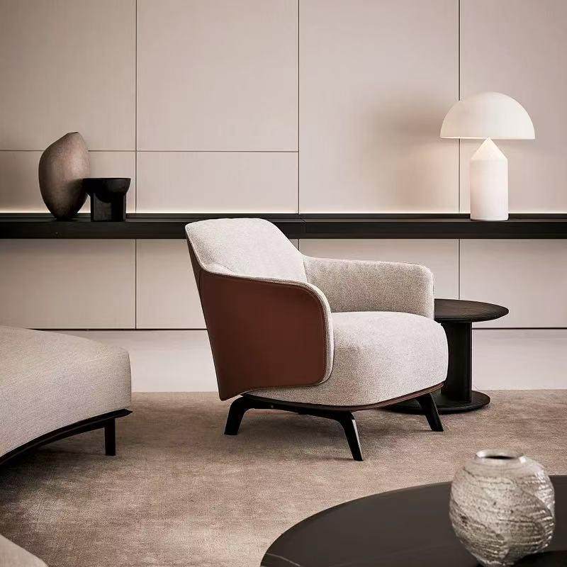 意式极简客厅皮艺沙发椅设计师款单人休闲椅酒店展厅售楼部洽谈椅