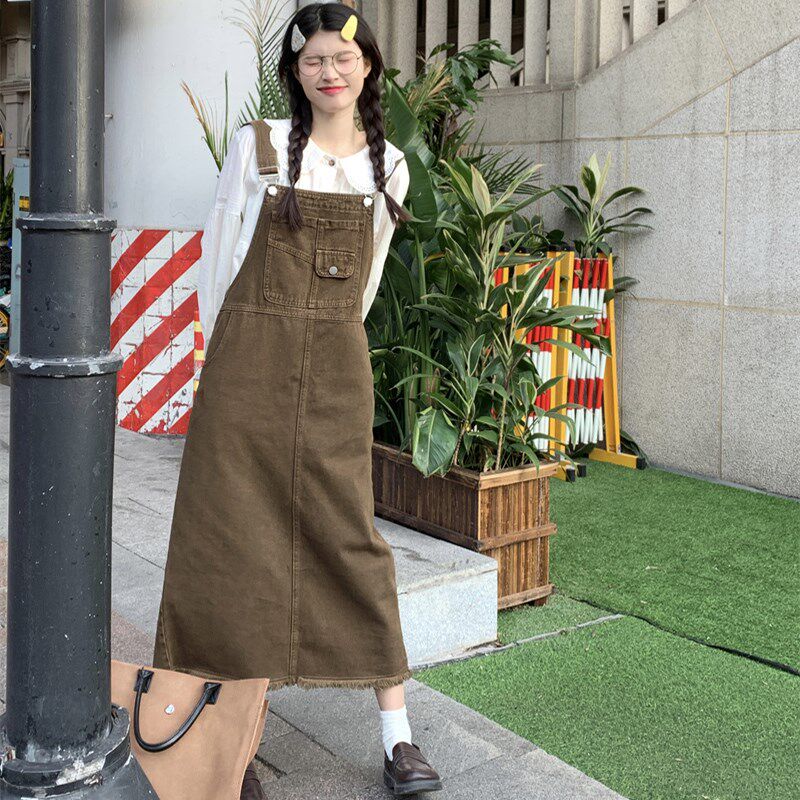 美式复古牛仔背带连衣裙女秋冬2024新款毛边设计感宽松中长款裙子