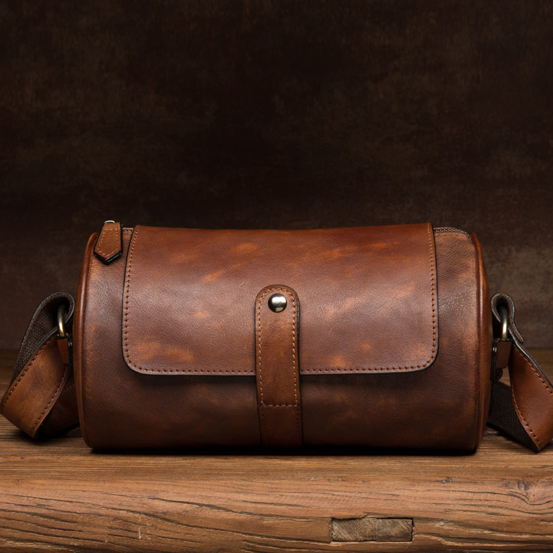 男女通用植鞣皮斜挎水桶包真皮单肩包头层牛皮休闲复古圆筒小挎包