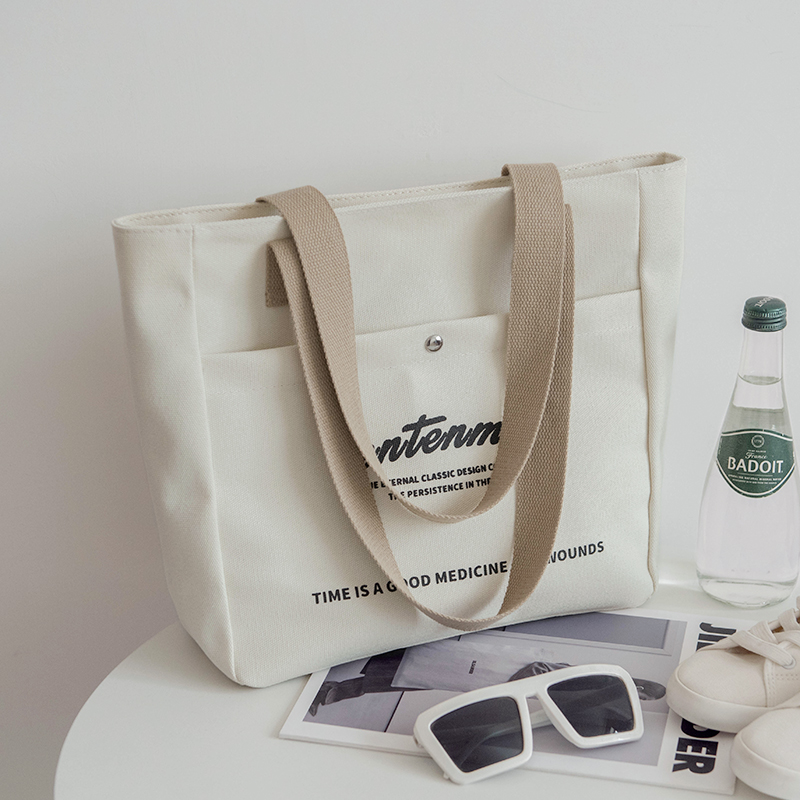 大容量帆布包女日系o简约时尚字母学生布包上课书包上班休闲单肩