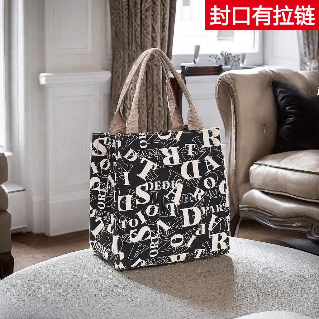 2024新d款帆布装饭盒袋子手提便当手拎外出学生上班族带饭午餐包