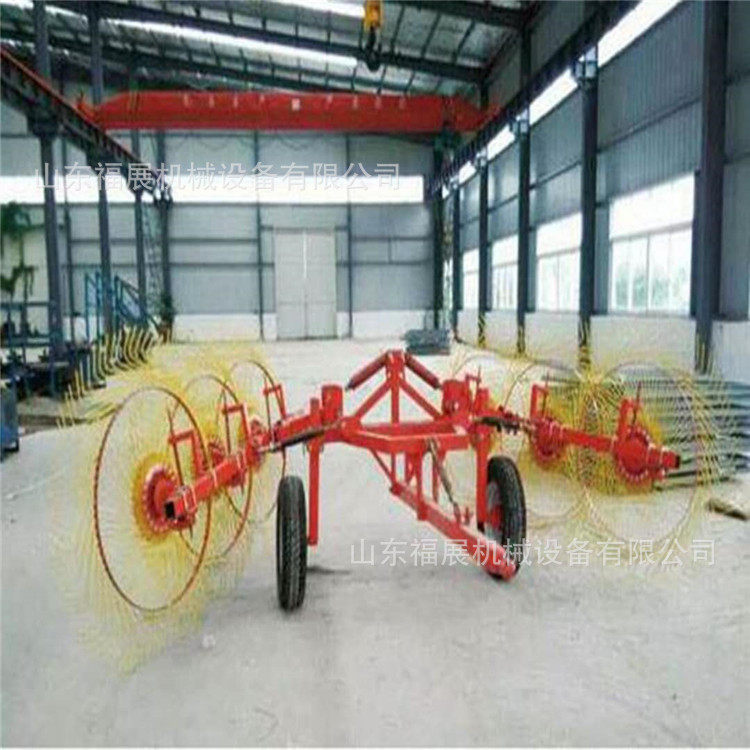 小苗水稻秸秆收集机直销 新款液压牵引式牧草圆盘搂草机