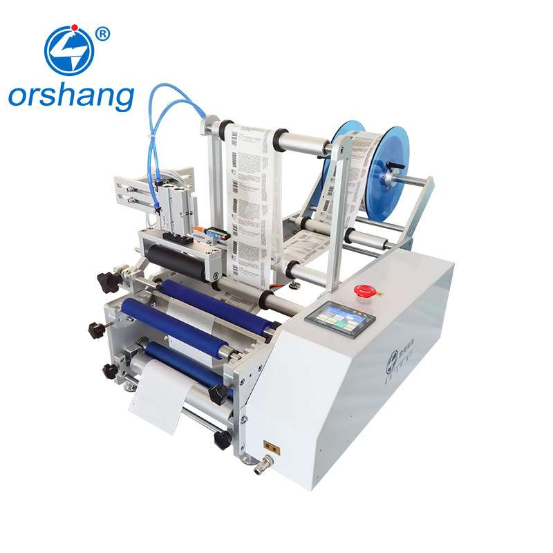 Semi-automatic fruit juice round bottle labeling machine