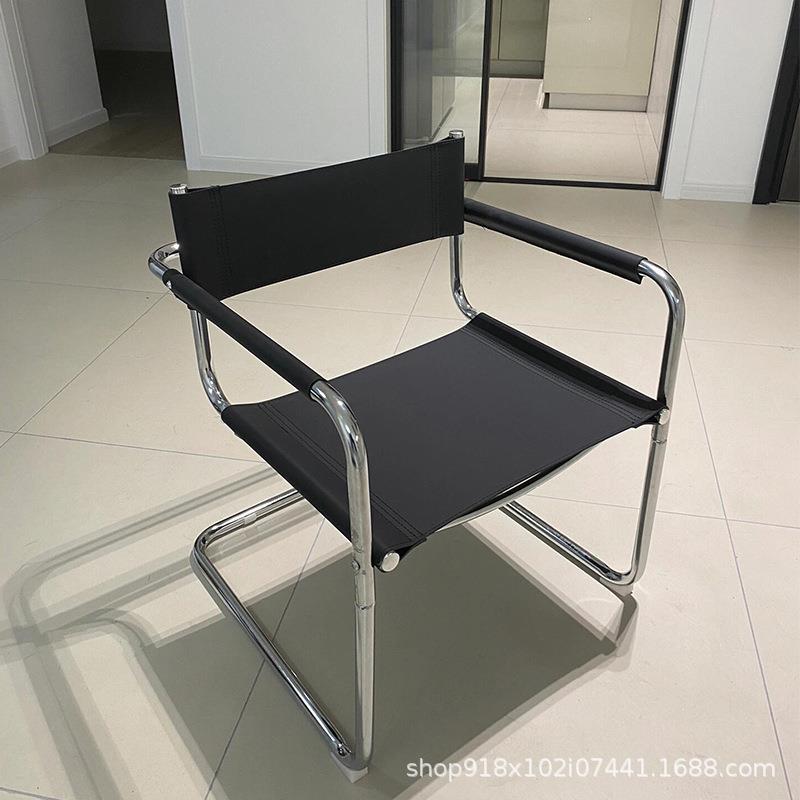 现代轻奢马鞍中古椅子舒适办公椅皮餐椅不锈钢管椅网红扶手椅家用