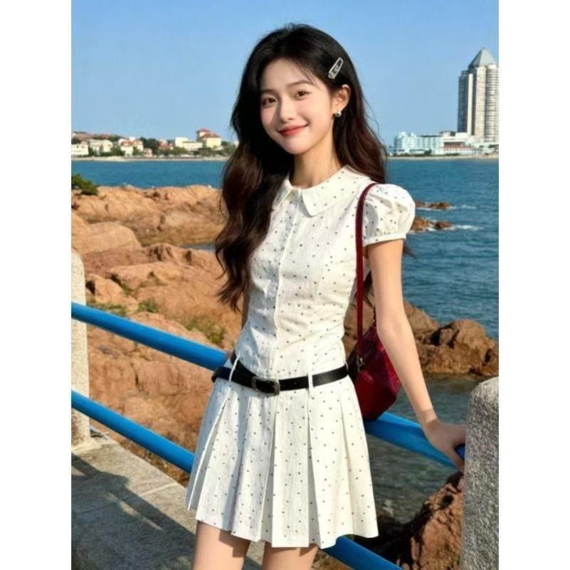 韩系减龄白色波点泡泡袖连衣裙子女新款夏季收腰工字褶高级a字裙