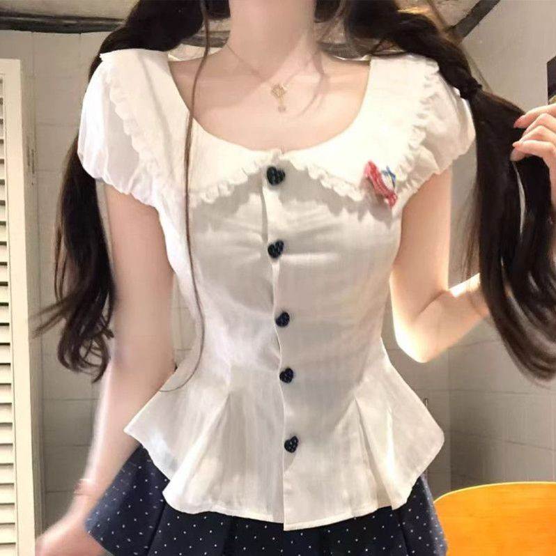 2026夏季甜美风娃娃领修身白色衬衫搭配藏青波点百褶裙显瘦新款