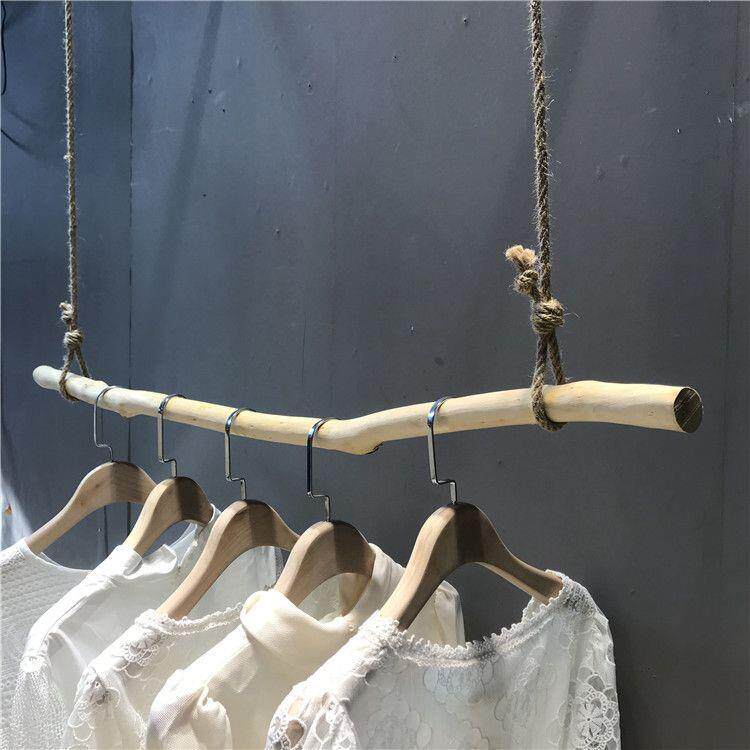 童装店麻绳树枝挂衣杆服装店上墙展示架实木衣架壁挂装修陈列货架