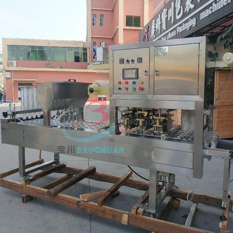 宝川全自动酸奶果茶汁饮料液体封杯自动扣盖包装机生产线