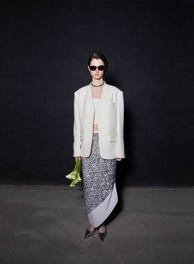 APARALLEL斜下摆开衩亮片半身裙