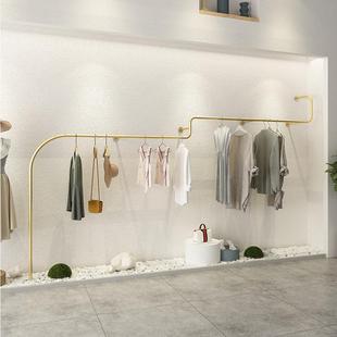 女装店金色衣服陈列展示架服装店壁挂式上墙衣帽架创意造型挂衣架