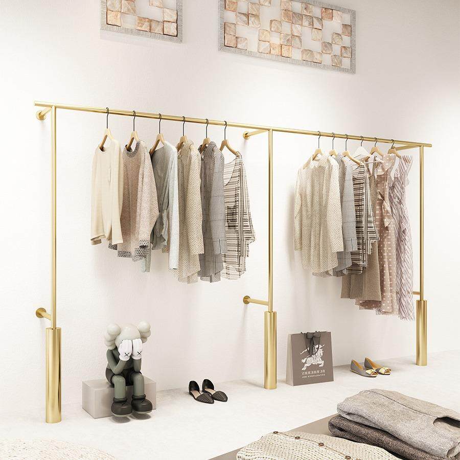 高档服装店展示架上墙壁挂式挂衣杆子金色女装店陈列货架侧挂货架