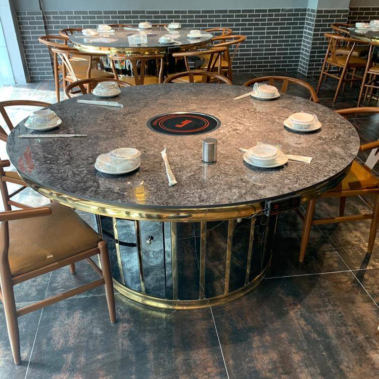 东莞鸿运烤全羊门宴餐厅轻奢黑钛金不锈钢星空黑岩板火锅餐桌椅