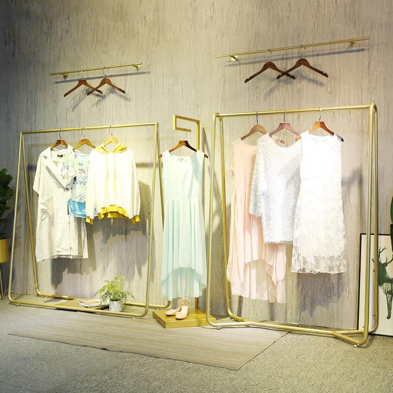 金色服装架女装店上墙货架服装店展示架落地式挂衣架店铺装修设计