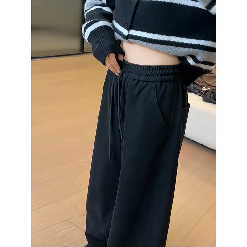 春季百搭牛仔裤女2025春款新款松紧腰简约休闲风弯刀显瘦长裤子