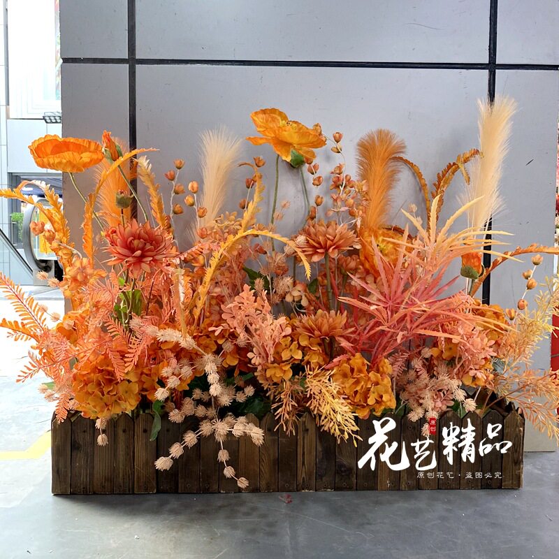 橘色系地台橱窗屋顶墙面绢花