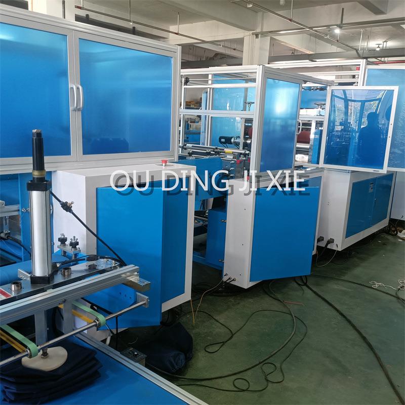 厂家供应无纺布桑拿裤制造机一次性短裤机械设备厂家