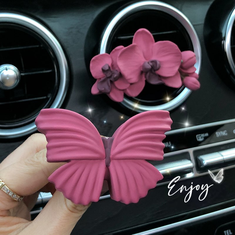 高级感蝴蝶兰车载香薰车用空调出风口装饰香水蝴蝶车内饰品摆件女
