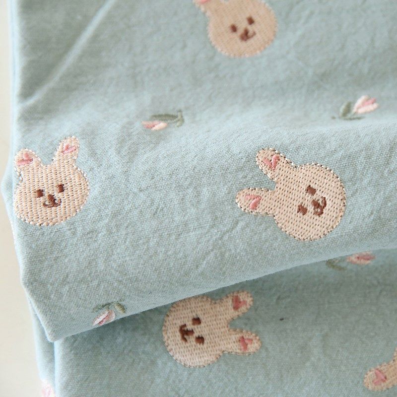 布悟青色卡通兔子刺绣布料棉麻绣花做抱枕坐垫沙发套手工DIY面料