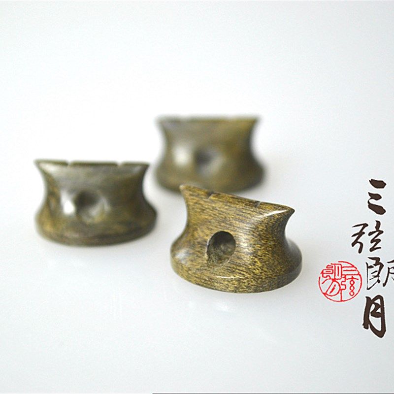 * 千年阴沉木码二胡码 绿料金丝楠木 专业琴码子 腰鼓型