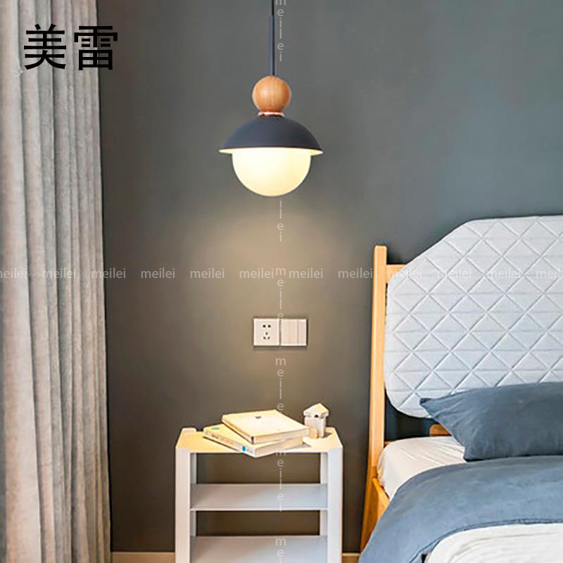北欧风格单头餐厅吊灯简约现代创意实木马卡龙主卧室书房床头灯具