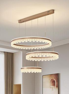 意餐厅吊灯现代式简约极简圆环轻奢大气卧灯202565室新款艺术餐厅