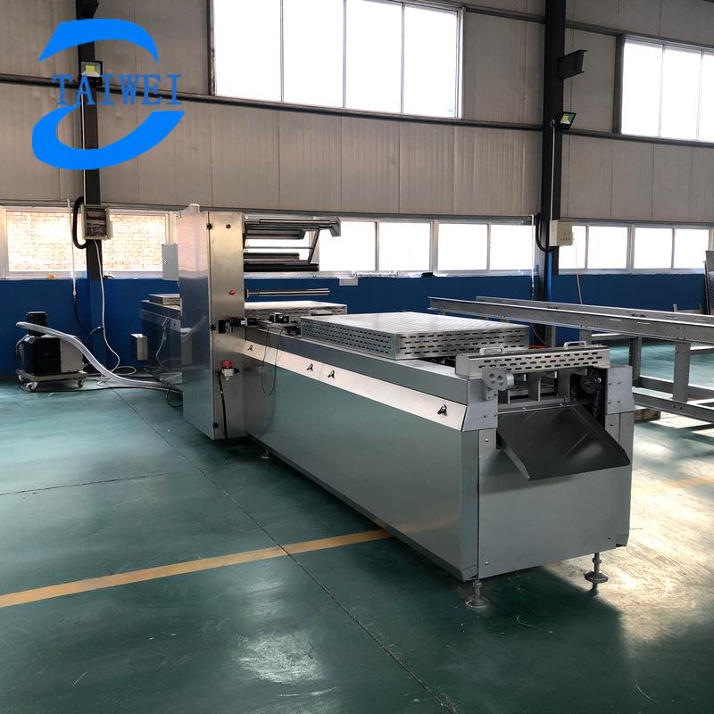 炒年糕拉伸膜成型封口机全自动奶酪不锈钢连续式拉伸真空包装机