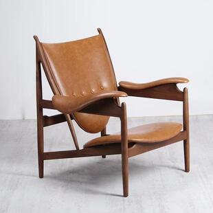 北欧民宿酒店实木酋长椅真皮沙发椅工程餐厅咖啡厅设计师款椅子