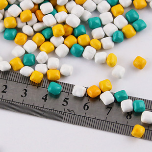 儿童仿瓷沙粒沙滩玩具宝宝玩沙大颗粒挖沙家用室内决明子彩石工具