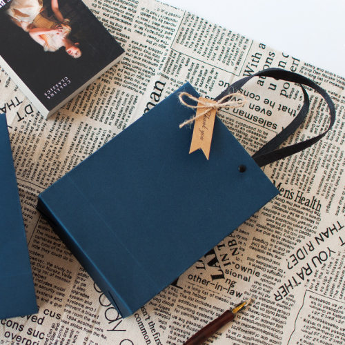 Blue gift bag, simple paper bag, rivet in hand, gift box,