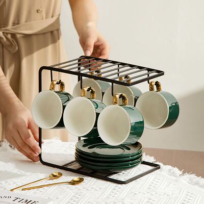 Classic ceramic coffee cup with gold handle creative design